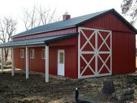 25x40x12 post-frame garage and ag building with 8' porch in Valencia, PA
